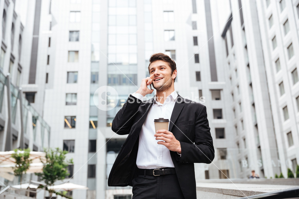 Young professional multitasking in the city