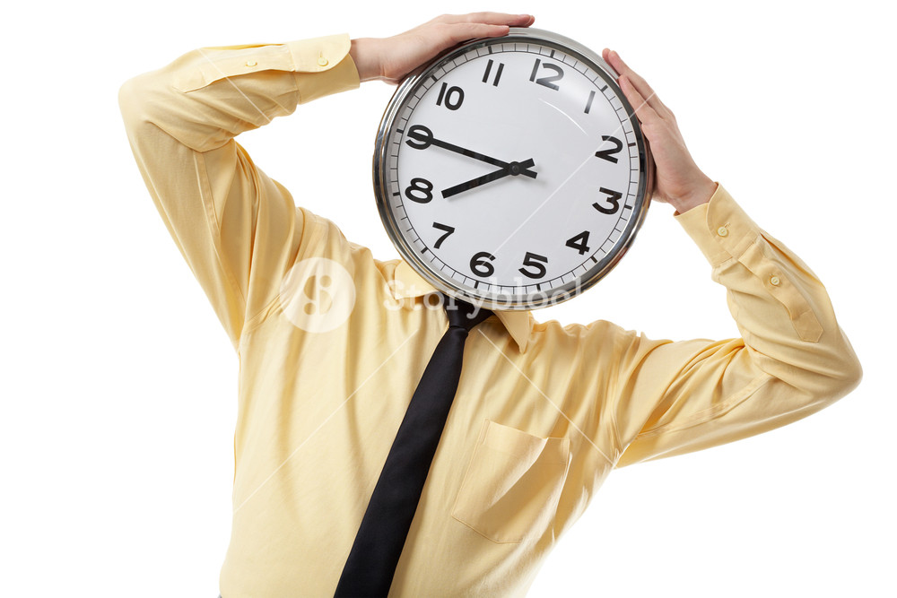 Portrait of a businessman with clock instead of head